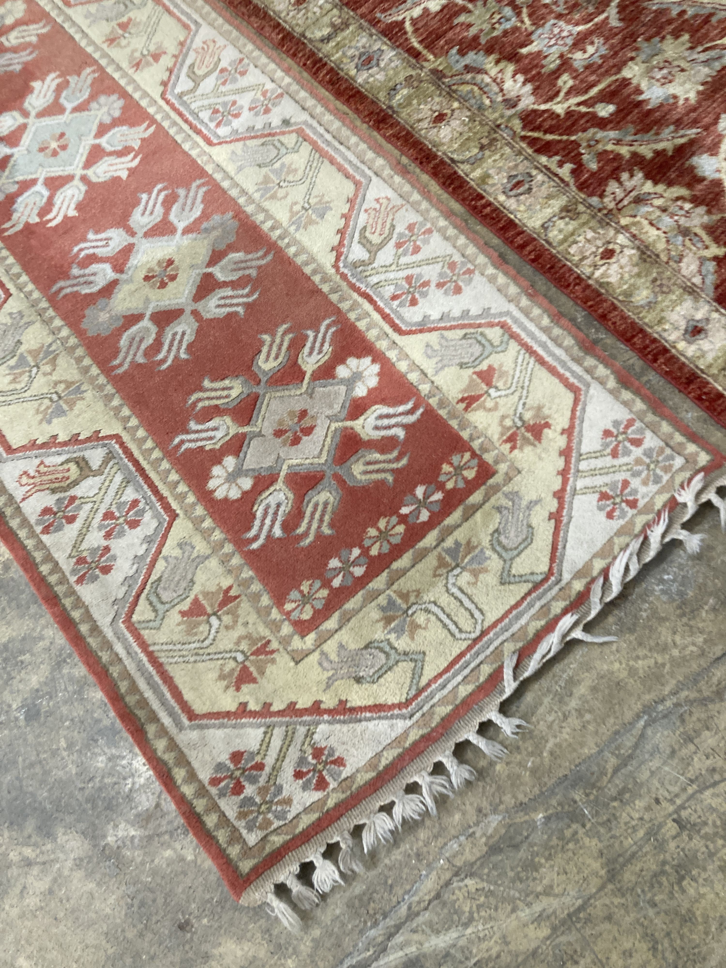 An Afghan Ziegler peach ground runner and another runner, largest 310 x 84cm